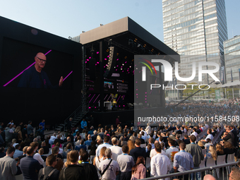 Timotheus Hoettges, CEO of Deutsche Telekom, speaks on the stage at Media Park on the opening day of Deutsche Telekom's Digital X event in C...