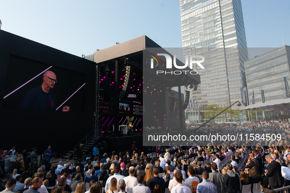 Timotheus Hoettges, CEO of Deutsche Telekom, speaks on the stage at Media Park on the opening day of Deutsche Telekom's Digital X event in C...