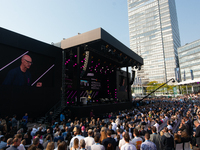 Timotheus Hoettges, CEO of Deutsche Telekom, speaks on the stage at Media Park on the opening day of Deutsche Telekom's Digital X event in C...