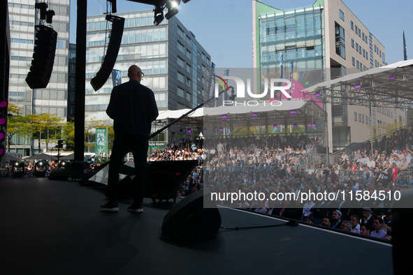 Timotheus Hoettges, CEO of Deutsche Telekom, speaks on the stage at Media Park on the opening day of Deutsche Telekom's Digital X event in C...