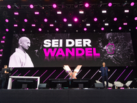 Timotheus Hoettges, CEO of Deutsche Telekom, speaks on the stage at Media Park on the opening day of Deutsche Telekom's Digital X event in C...