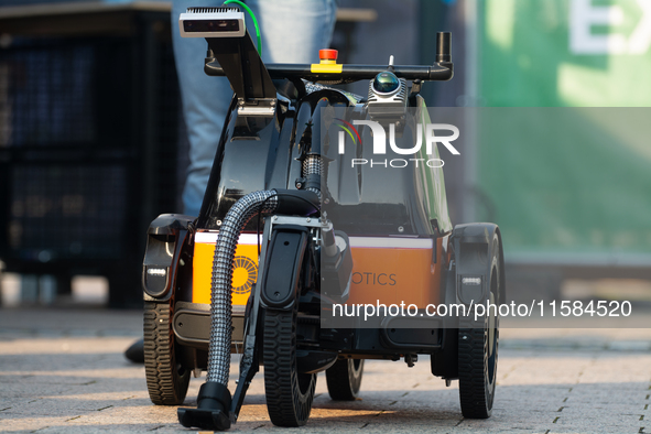 The Butty robot from the Danish robotics company demonstrates cleaning cigarette butts on the opening day of Deutsche Telekom's Digital X ev...