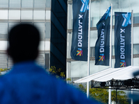 The flags of Digital X are seen on the opening day of Deutsche Telekom's Digital X event at Media Park in Cologne, Germany, on September 18,...