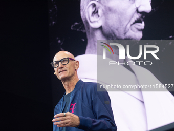 Timotheus Hoettges, CEO of Deutsche Telekom, speaks on the stage at Media Park on the opening day of Deutsche Telekom's Digital X event in C...