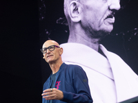 Timotheus Hoettges, CEO of Deutsche Telekom, speaks on the stage at Media Park on the opening day of Deutsche Telekom's Digital X event in C...