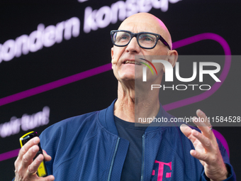 Timotheus Hoettges, CEO of Deutsche Telekom, speaks on the stage at Media Park on the opening day of Deutsche Telekom's Digital X event in C...