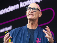 Timotheus Hoettges, CEO of Deutsche Telekom, speaks on the stage at Media Park on the opening day of Deutsche Telekom's Digital X event in C...