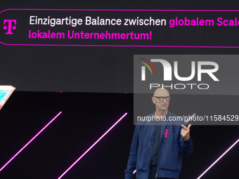 Timotheus Hoettges, CEO of Deutsche Telekom, speaks on the stage at Media Park on the opening day of Deutsche Telekom's Digital X event in C...