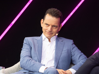 Leonhard Birnbaum, Chief Executive Officer of E.ON SE, stands on the stage at Media Park on the opening day of Deutsche Telekom's Digital X...