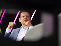 Leonhard Birnbaum, Chief Executive Officer of E.ON SE, stands on the stage at Media Park on the opening day of Deutsche Telekom's Digital X...