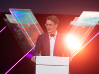 Hendrik Wust, Prime Minister of North Rhine-Westphalia, speaks on the stage at Media Park on the opening day of Deutsche Telekom's Digital X...