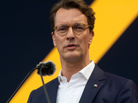 Hendrik Wust, Prime Minister of North Rhine-Westphalia, speaks on the stage at Media Park on the opening day of Deutsche Telekom's Digital X...