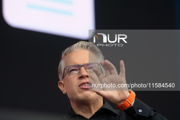 Frank Thelen, German entrepreneur, speaks on the stage at Media Park on the opening day of Deutsche Telekom's Digital X event in Cologne, Ge...