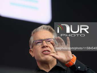 Frank Thelen, German entrepreneur, speaks on the stage at Media Park on the opening day of Deutsche Telekom's Digital X event in Cologne, Ge...