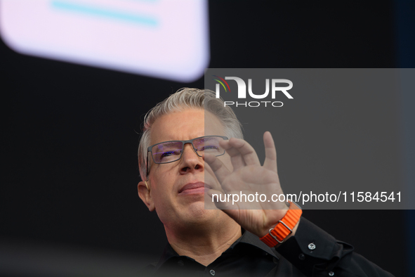 Frank Thelen, German entrepreneur, speaks on the stage at Media Park on the opening day of Deutsche Telekom's Digital X event in Cologne, Ge...