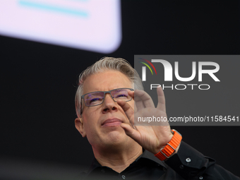 Frank Thelen, German entrepreneur, speaks on the stage at Media Park on the opening day of Deutsche Telekom's Digital X event in Cologne, Ge...