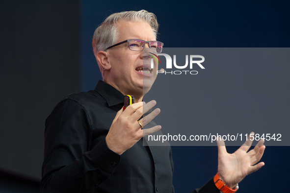 Frank Thelen, German entrepreneur, speaks on the stage at Media Park on the opening day of Deutsche Telekom's Digital X event in Cologne, Ge...