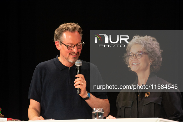 Claudia Nemat, Chief Technology and Innovation Officer of Deutsche Telekom, and Dr. Eckart von Hirschhausen speak on the opening day of Deut...