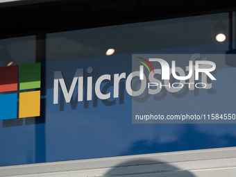 A Microsoft sign is seen at Media Park on the opening day of Deutsche Telekom's Digital X event in Cologne, Germany, on September 18, 2024....