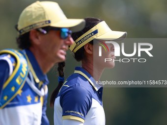 GAINESVILLE, VIRGINIA - SEPTEMBER 15: Celine Boutier of Team Europe walks with ther caddie on the 12th fairway during the final round of the...