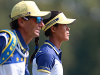 GAINESVILLE, VIRGINIA - SEPTEMBER 15: Celine Boutier of Team Europe walks with ther caddie on the 12th fairway during the final round of the...