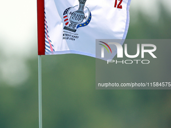 GAINESVILLE, VIRGINIA - SEPTEMBER 15: The flag at the 12th green wafts in the breeze during the final round of the Solheim Cup at Robert Tre...