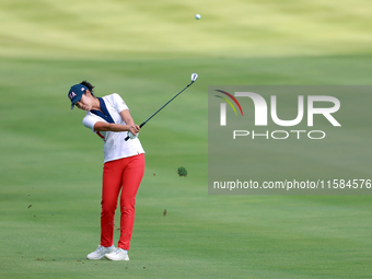 GAINESVILLE, VIRGINIA - SEPTEMBER 15: Andrea Lee of the United States hits from the 12th fairway during the final round of the Solheim Cup a...