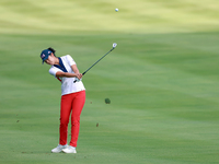 GAINESVILLE, VIRGINIA - SEPTEMBER 15: Andrea Lee of the United States hits from the 12th fairway during the final round of the Solheim Cup a...