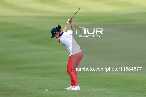 GAINESVILLE, VIRGINIA - SEPTEMBER 15: Andrea Lee of the United States hits from the 12th fairway during the final round of the Solheim Cup a...