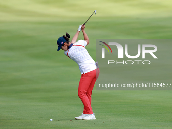 GAINESVILLE, VIRGINIA - SEPTEMBER 15: Andrea Lee of the United States hits from the 12th fairway during the final round of the Solheim Cup a...