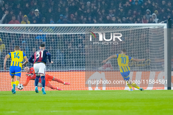 Lukasz Skorupski of Bologna FC saves on Heorhiy Sudakov of FC Shakhtar Donetsk during the UEFA Champions League 2024/25 League Phase MD1 mat...