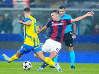 Heorhiy Sudakov of FC Shakhtar Donetsk and Nikola Moro of Bologna FC compete for the ball during the UEFA Champions League 2024/25 League Ph...