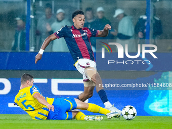 Dan Ndoye of Bologna FC and Valeriy Bondar of FC Shakhtar Donetsk compete for the ball during the UEFA Champions League 2024/25 League Phase...