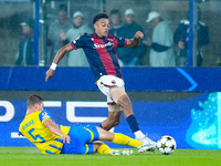 Dan Ndoye of Bologna FC and Valeriy Bondar of FC Shakhtar Donetsk compete for the ball during the UEFA Champions League 2024/25 League Phase...