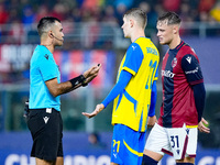 Referee tallks to Artem Bondarenko of FC Shakhtar Donetsk and Sam Beukema of Bologna FC during the UEFA Champions League 2024/25 League Phas...