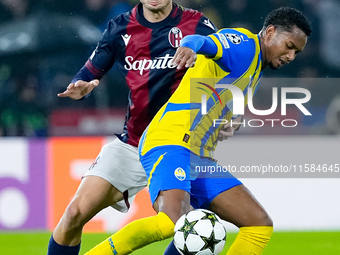 Stefan Posch of Bologna FC and Newerton of FC Shakhtar Donetsk compete for the ball during the UEFA Champions League 2024/25 League Phase MD...