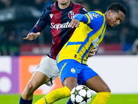 Stefan Posch of Bologna FC and Newerton of FC Shakhtar Donetsk compete for the ball during the UEFA Champions League 2024/25 League Phase MD...