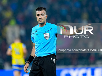 referee Rohit Saggi gestures during the UEFA Champions League 2024/25 League Phase MD1 match between Bologna FC and FC Shakhtar Donetsk at S...