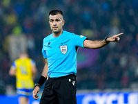 referee Rohit Saggi gestures during the UEFA Champions League 2024/25 League Phase MD1 match between Bologna FC and FC Shakhtar Donetsk at S...