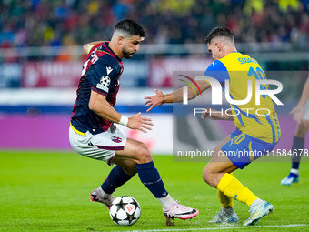 Riccardo Orsolini of Bologna FC and Heorhiy Sudakov of FC Shakhtar Donetsk compete for the ball during the UEFA Champions League 2024/25 Lea...