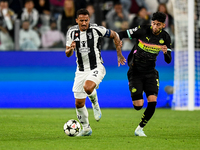 Danilo of Juventus fights for the ball with Ricardo Pepi of PSV during the UEFA Champions League 2024/25 League Phase MD1 match between Juve...