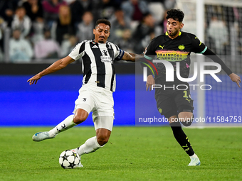 Danilo of Juventus fights for the ball with Ricardo Pepi of PSV during the UEFA Champions League 2024/25 League Phase MD1 match between Juve...