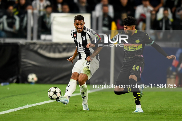 Danilo of Juventus fights for the ball with Ricardo Pepi of PSV during the UEFA Champions League 2024/25 League Phase MD1 match between Juve...