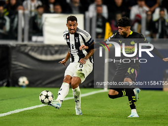 Danilo of Juventus fights for the ball with Ricardo Pepi of PSV during the UEFA Champions League 2024/25 League Phase MD1 match between Juve...