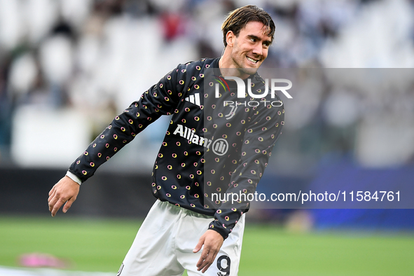 Dusan Vlahovic smiles for Juventus during the UEFA Champions League 2024/25 League Phase MD1 match between Juventus and PSV Eindhoven at Juv...