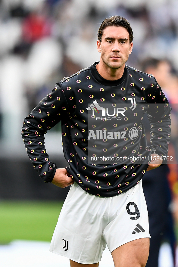 Dusan Vlahovic smiles for Juventus during the UEFA Champions League 2024/25 League Phase MD1 match between Juventus and PSV Eindhoven at Juv...