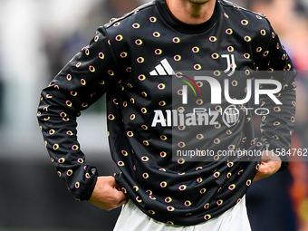 Dusan Vlahovic smiles for Juventus during the UEFA Champions League 2024/25 League Phase MD1 match between Juventus and PSV Eindhoven at Juv...