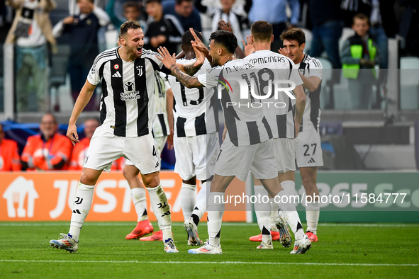 Federico Gatti of Juventus and Nicolas Gonzalez of Juventus celebrate during the UEFA Champions League 2024/25 League Phase MD1 match betwee...