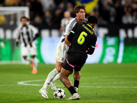 Dusan Vlahovic of Juventus contends for the ball with Ryan Flamingo of PSV during the UEFA Champions League 2024/25 League Phase MD1 match b...