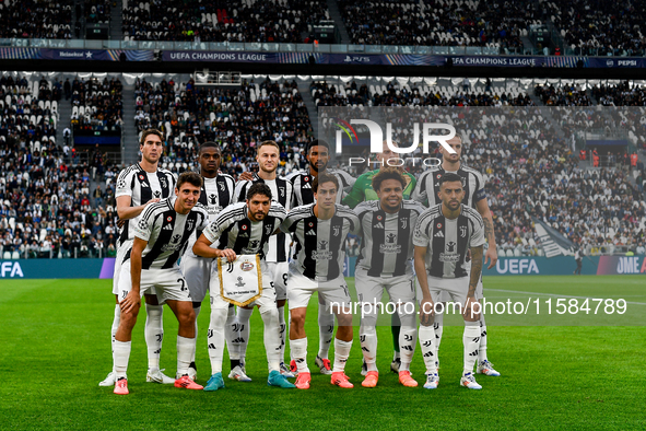 The Juventus team poses during the UEFA Champions League 2024/25 League Phase MD1 match between Juventus and PSV Eindhoven at Juventus Stadi...